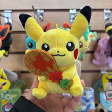 Load image into Gallery viewer, Pokemon Center Hiroshima Pikachu Rice Paddle Version Keychain
